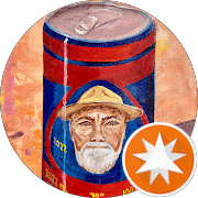 Painted red and blue soda can featuring a bearded man and orange star icon.